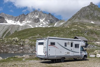 Motorhome in alpine landscape near Nufenen Pass