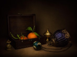 Still life with mandarins in a wooden box