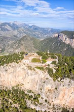 Ruin of the castle Castell Alaro in Majorca landscape mountains mountain holiday travel aerial photo in Alaro