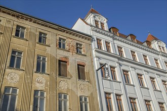 Renovated and unrenovated house