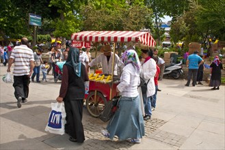 Bazaar street with corncob seller