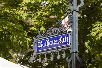 Street sign Rathausplatz with ornaments
