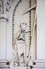 Stucco sculpture depicting death