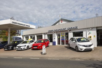 Second hand car sales on garage forecourt of motor dealership