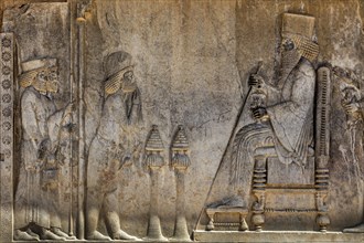 Relief of King Darius enthroned under a canopy