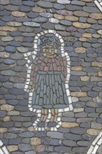 Female figure as pavement mosaic on the pavement