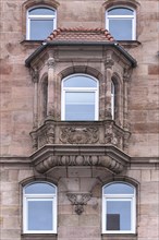 Sandstone bay window in neo-Renaissance style