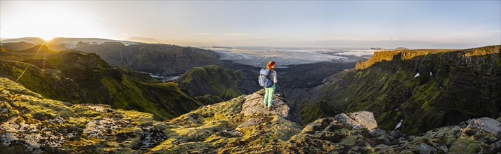 Hiker looks over spectacular landscape