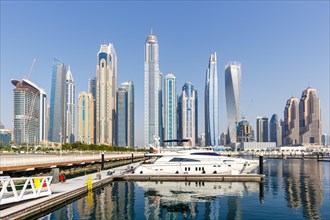 Dubai Marina and Harbour Skyline Architecture Luxury Holidays in Arabia with Boat Yacht in Dubai