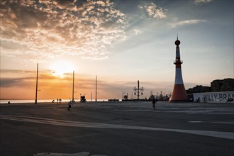 Willy-Brandt-Platz with lighthouse Unterfeuer at sunset