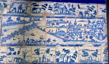 Blue painted tiles with the city of Seville