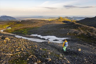 Hiker walks through spectacular landscape