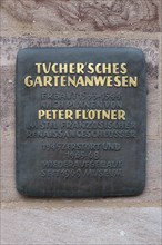 Information board about the Tucher`sche Gartenanwesen at the Tucherschloss