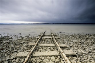 Old tracks lead into Lake Constance near Sturm
