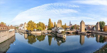 Petite France bridge over river Ill water with tower panorama text free space Copyspace Alsace in Strasbourg
