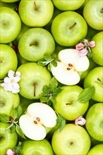 Apples fruits green apple fruit background with flowers and leaves