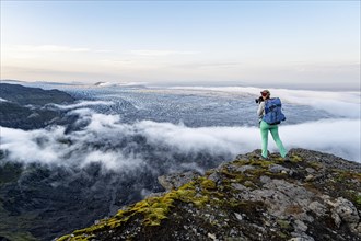 Hiker photographs spectacular landscape