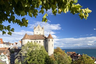 Meersburg Castle in the sunshine with a view of the Alps