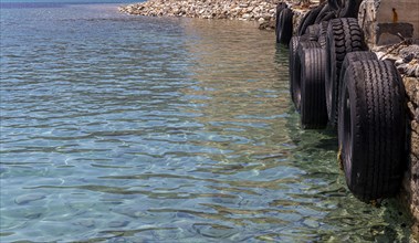 Buffer of tyres at a jetty on the island of Spinalonga