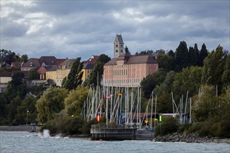 New Meersburg Castle with Church of the Visitation of the Virgin Mary during storm