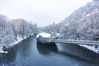 Mur river with Murinsel bridge in Graz