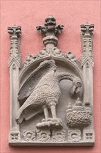 Sandstone relief depicting an eagle on a residential house