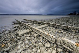 Old tracks lead into Lake Constance near Sturm