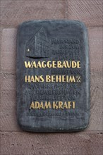 Information board on the former scales building about the scales relief by Hans Behaim from 1497