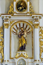 Side altar with saint figure