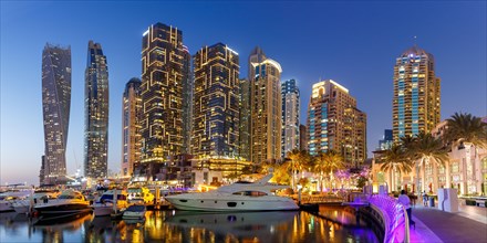 Dubai Marina and Harbour Skyline Architecture Luxury Holiday in Arabia with Boat Yacht by Night Panorama in Dubai