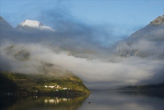 Rising fog in Geiranger Fjord