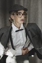 Young woman in dandy style