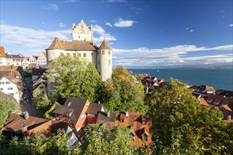 Meersburg Castle in the sunshine with a view of the Alps