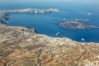 Santorini island holiday travel town Fira Thera on the Mediterranean Sea aerial view in Santorini