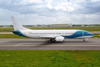 A Jonika Airlines Boeing 737-400 aircraft with registration UR-CSV at the airport in Amsterdam