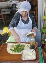 Drusin prepares a pita