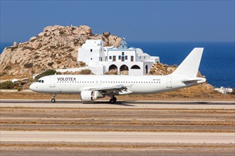 A Volotea Airbus A320 aircraft with registration number 9H-SLK at Santorini airport