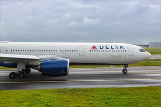 An Airbus A330-900neo aircraft of Delta Air Lines with registration N404DX at the airport in Amsterdam