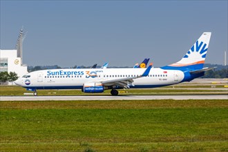 A Boeing 737-800 aircraft of SunExpress with registration TC-SNV at Munich Airport