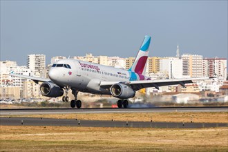 A Eurowings Airbus A319 with the registration D-AGWD at the airport in Faro