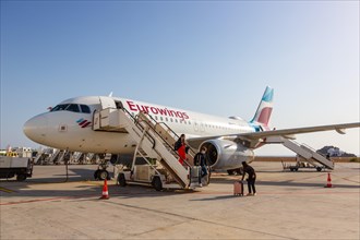An Airbus A319 aircraft of Eurowings with the registration D-AGWD at the airport in Santorini