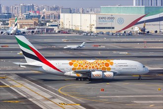 An Emirates Airbus A380-800 with registration A6-EOV at Dubai Airport