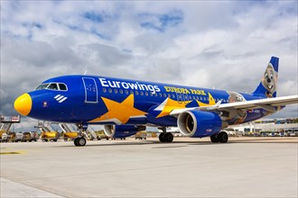A Eurowings Airbus A320 with the registration D-ABDQ in the Europa Park special livery at Stuttgart Airport