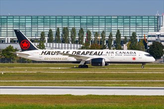 An Air Canada Boeing 787-9 Dreamliner aircraft with registration C-FVLQ and the Haut le drapeau special livery at Munich Airport