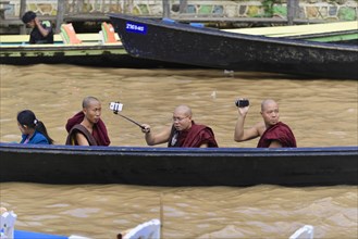 Monks with mobile phones