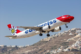 An Edelweiss Airbus A320 aircraft with registration HB-JJL at the airport in Santorini