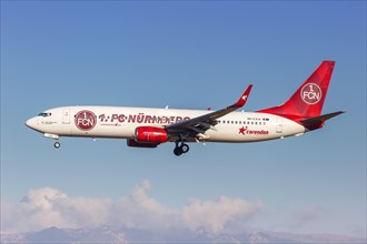 A Corendon Airlines Boeing 737-800 with registration number 9H-CXA in the 1. FC Nuremberg special livery lands at the airport in Palma de Majorca
