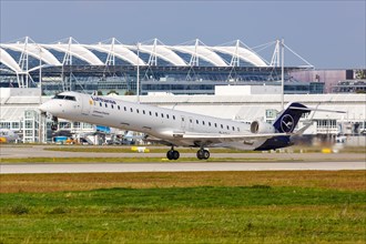 A Bombardier CRJ-900 aircraft of Lufthansa CityLine with the registration D-ACNG at the airport in Munich