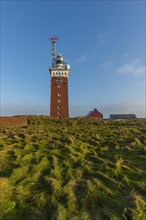 Brick lighthouse with radar antenna