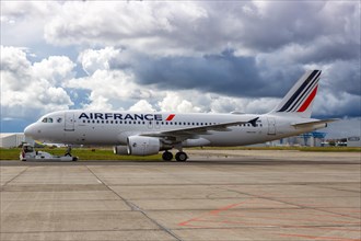 An Air France Airbus A320 aircraft with registration F-HBNE at Toulouse airport